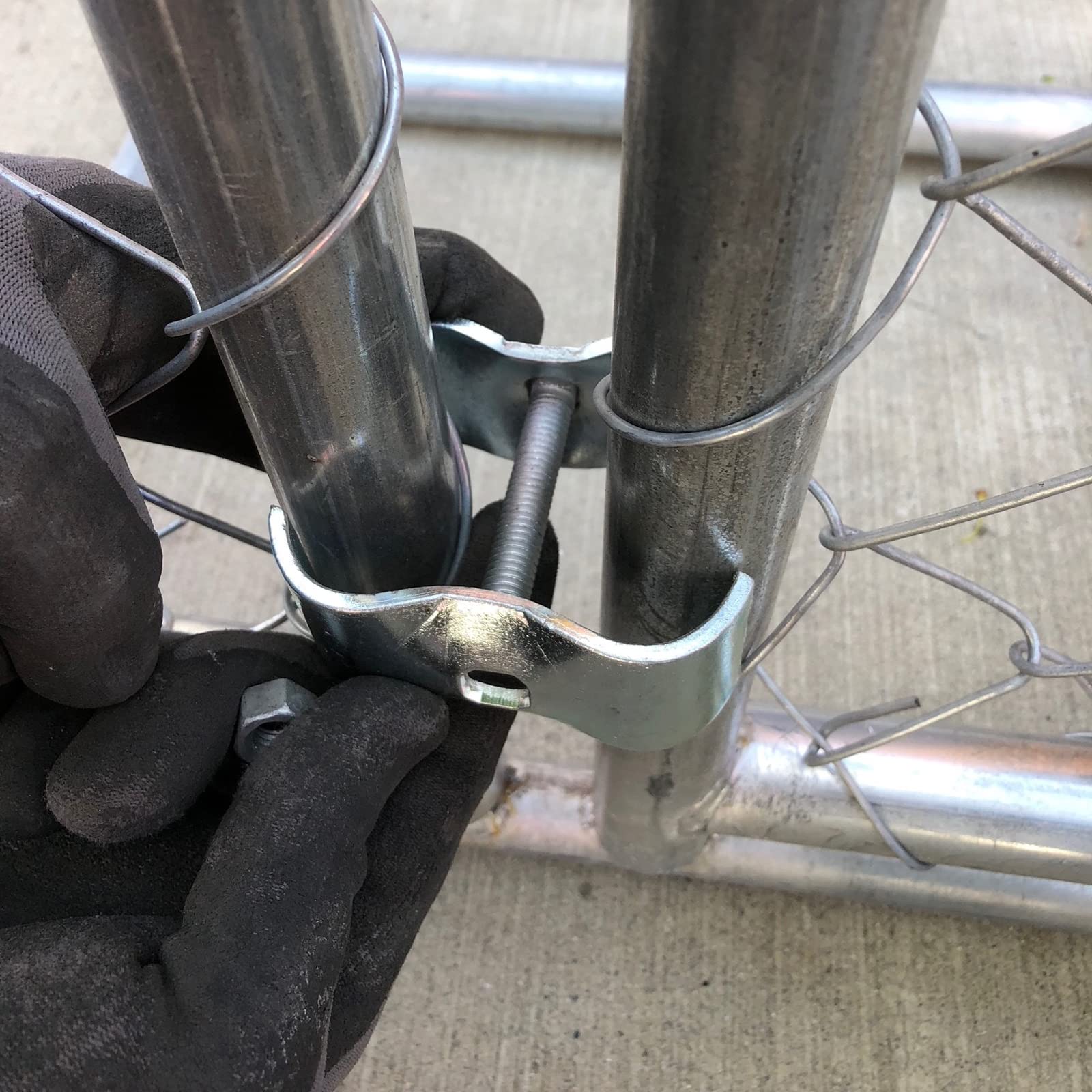 Durable Hoqqf clamps keep kennel panels aligned and secure.