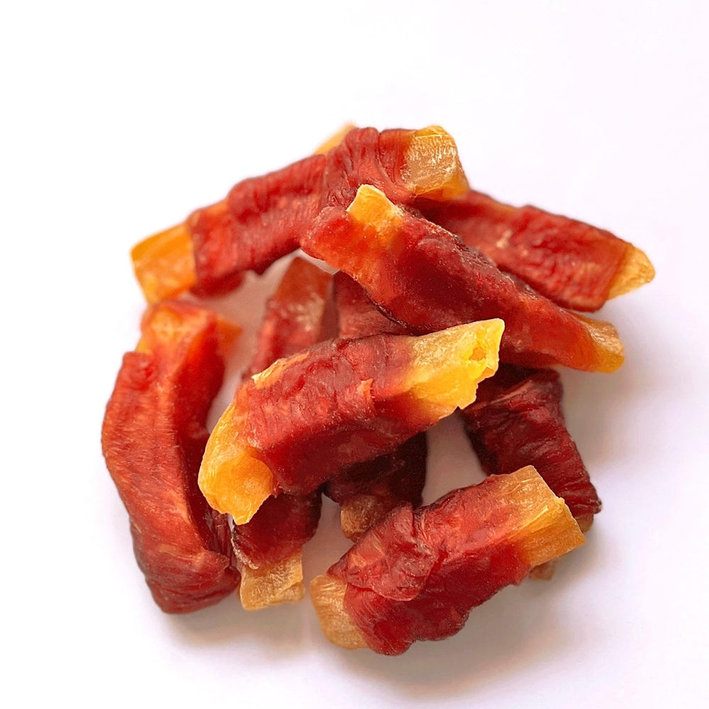 Close-up texture of Hubert Duck Wraps showing chewy, train-worthy bite