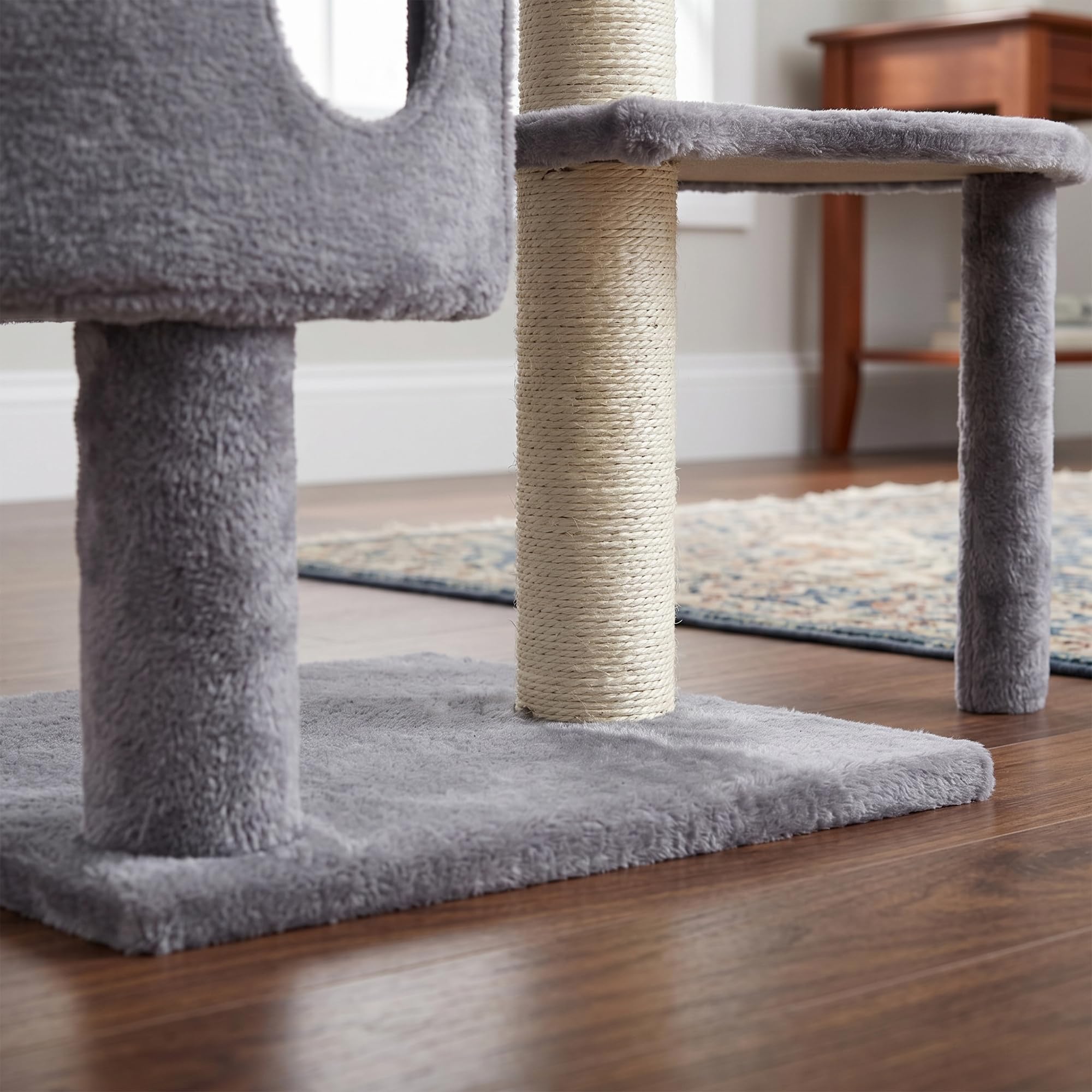 HUITREE cat tree features plush soft platforms for lounging