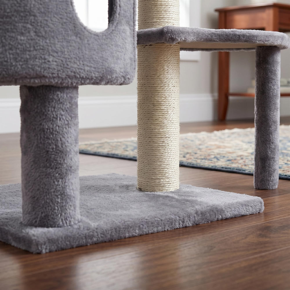 HUITREE cat tree features plush soft platforms for lounging