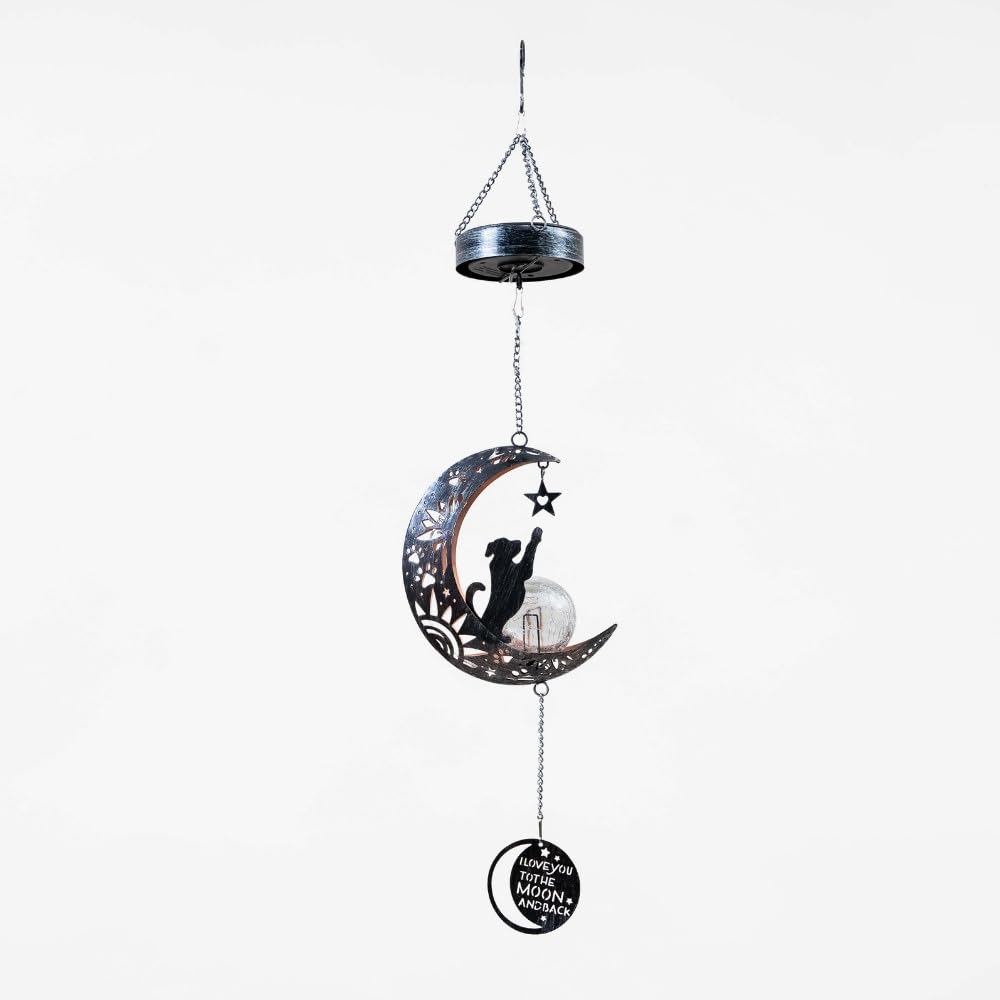 iHeartDogs iron crescent moon design shows pawprints and stars in a touching outdoor display