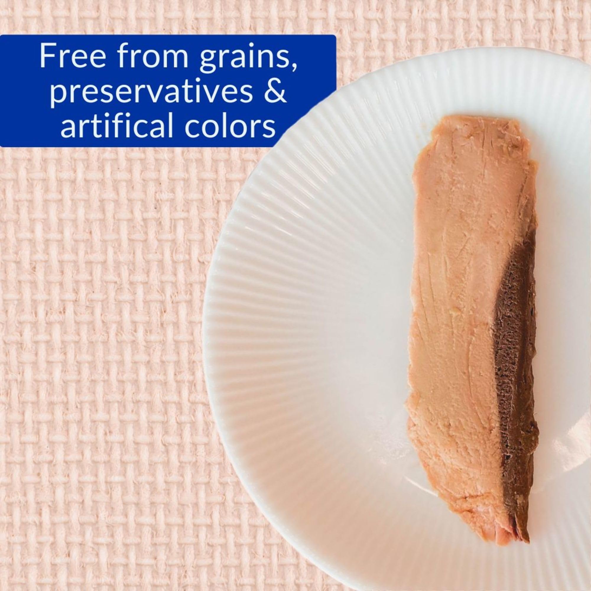 Cat enjoys INABA tuna fillet treats as a topper on meals.