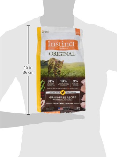 Real chicken bites visible in Instinct Original kibble indicate high-quality protein.