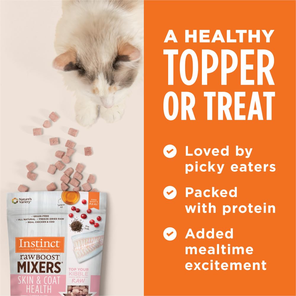 Instinct Raw Boost Mixers cat topper serving showing meal enhancement.