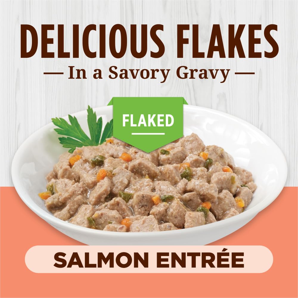 Instinct Flaked Entrée Salmon canned cat food highlights high-protein nutrition with real meat texture.