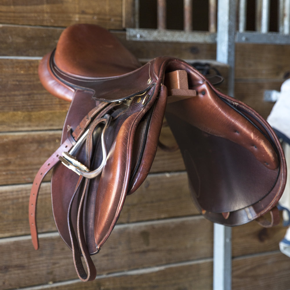 Intrepid International folding saddle rack offers portable, space-saving storage for tack