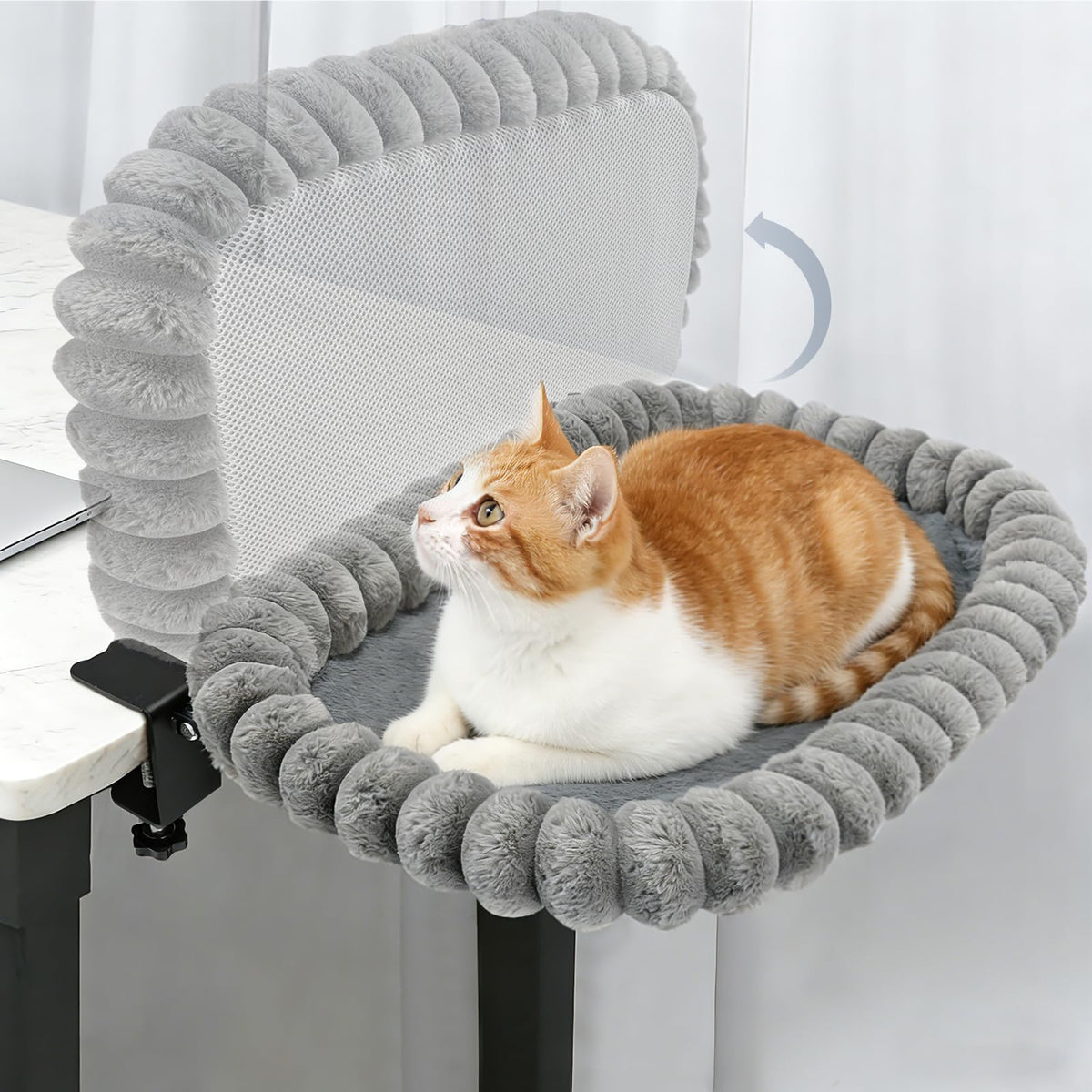 IPOW cat bed folded deskside for compact workspace and feline companionship.