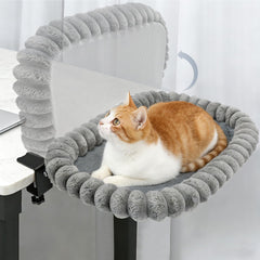 IPOW cat bed folded deskside for compact workspace and feline companionship.