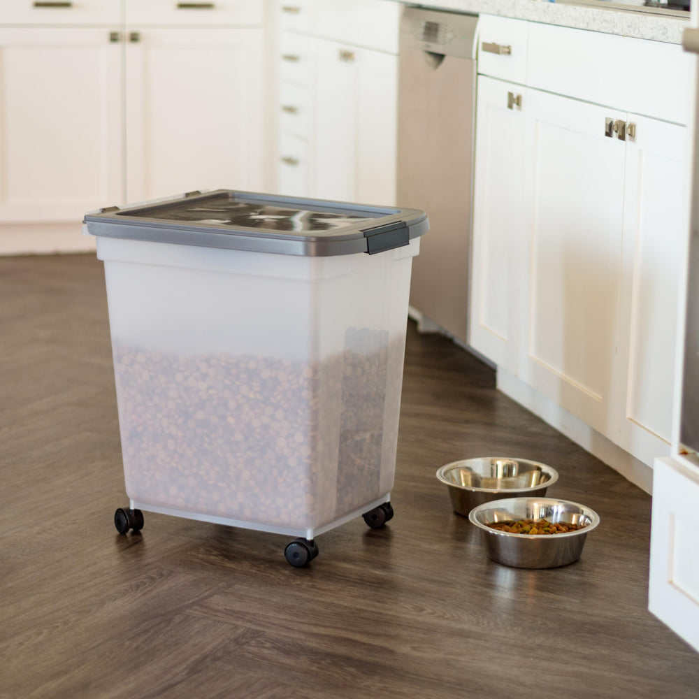 IRIS USA dog food container includes scoop for mess-free portioning at mealtime.