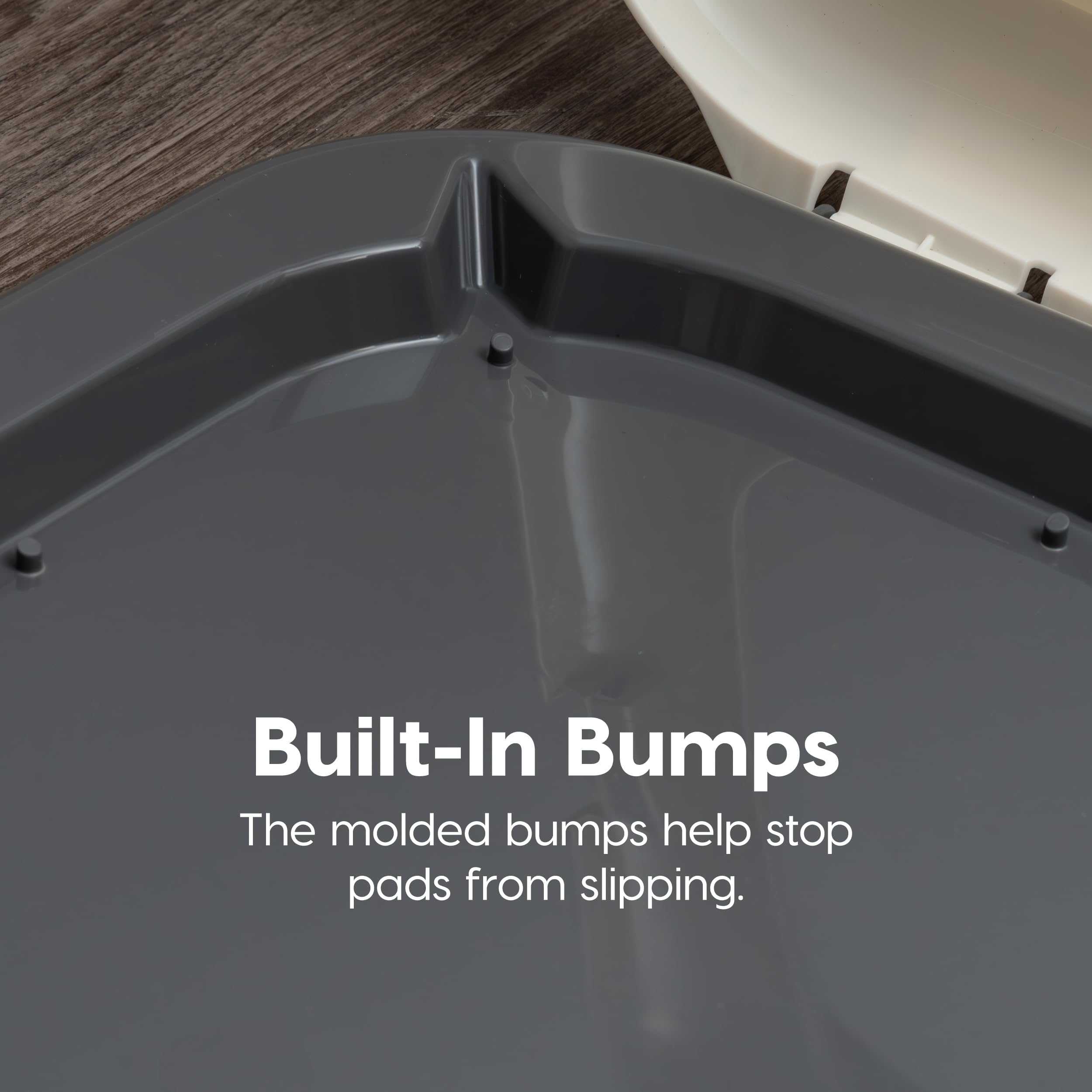 Easy-clean surface of IRIS pee pad holder for quick cleanup