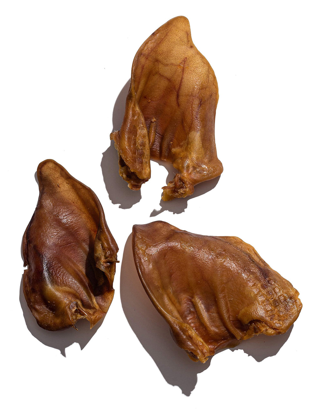 Jack&amp;Pup Whole Pig Ears 10 Pack — uncooked close-up showing thick, natural chew.
