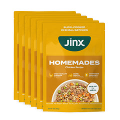 Jinx Chicken Wet Food pouch open, ready for a delicious dog dinner option.