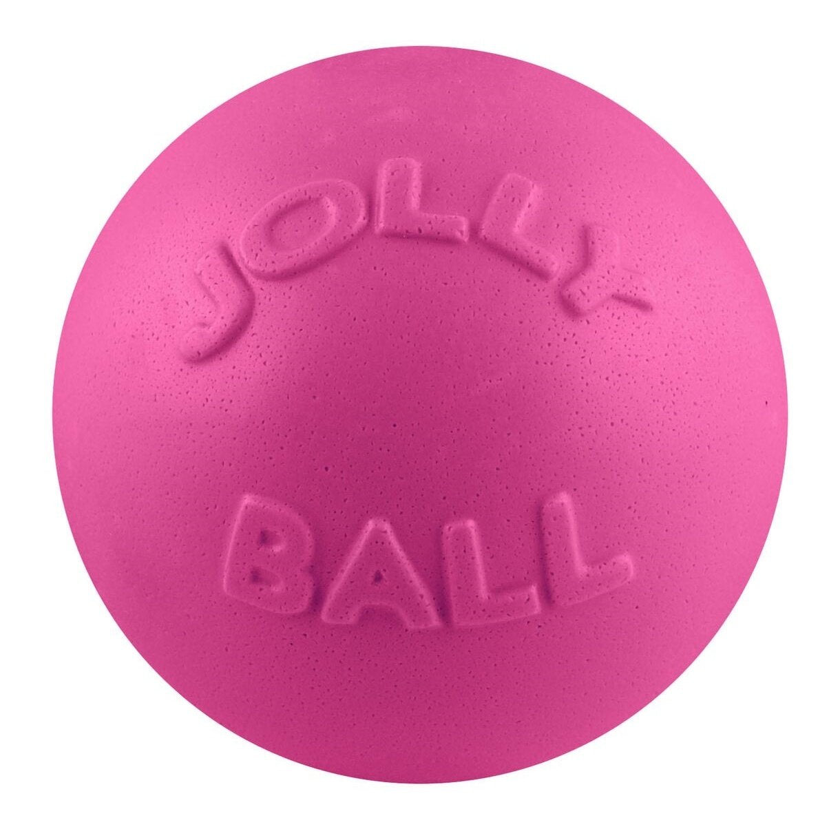 Dog enjoying Jolly Pets Bounce-N-Play blueberry toy during backyard play.