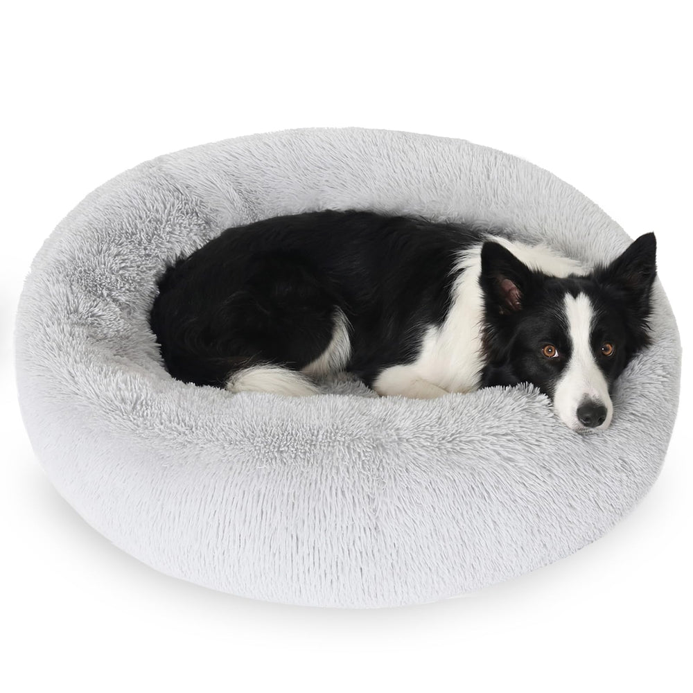 JOLLYVOGUE donut bed with fluffy plush fabric for cozy lounging.