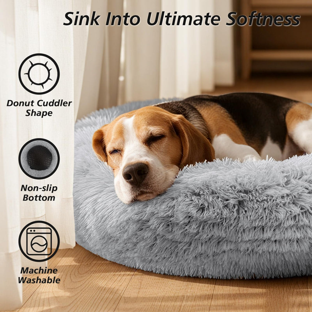 JOLLYVOGUE donut bed with raised rim for head and neck support.