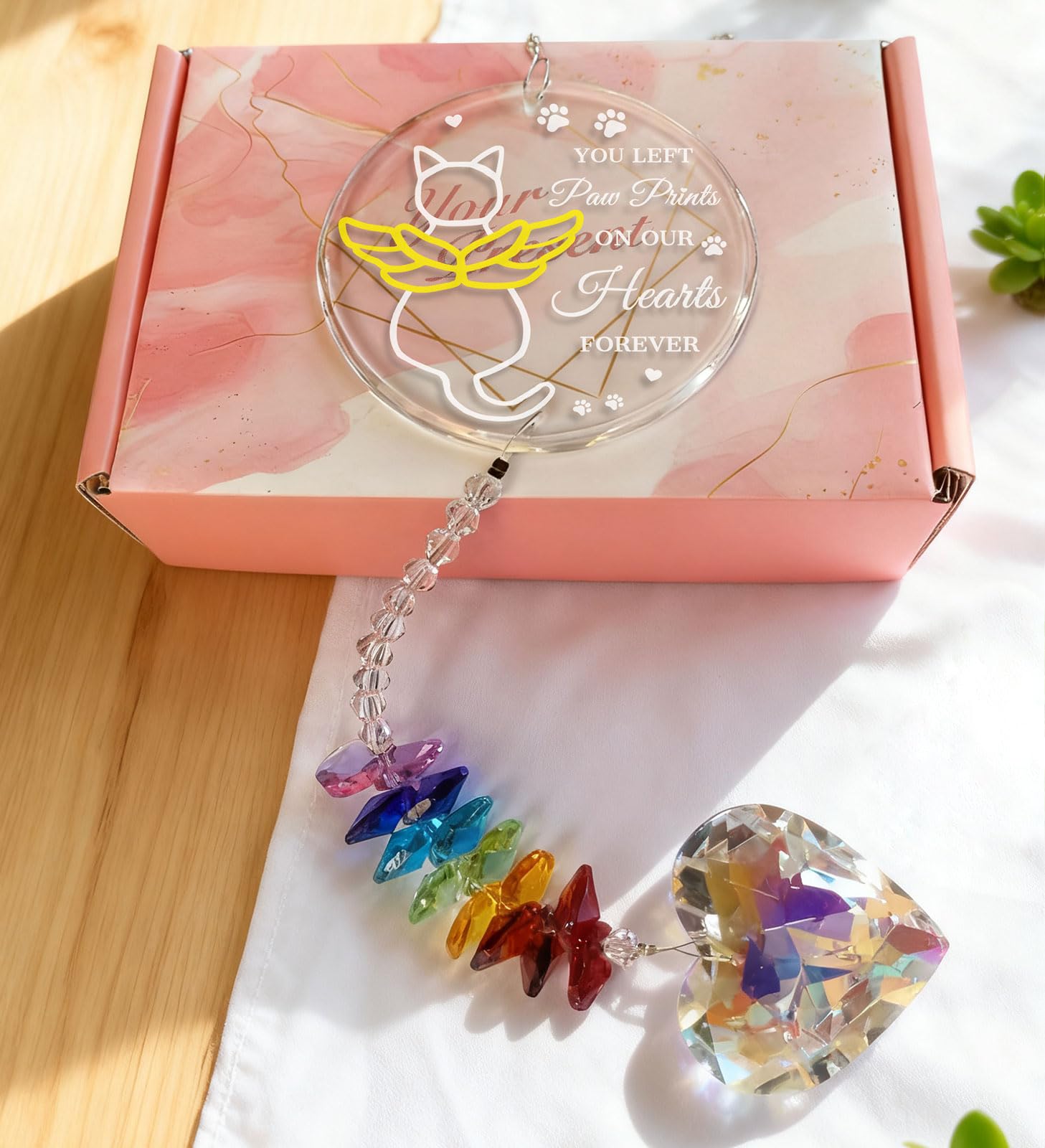 JSTLCD cat memorial suncatcher reflects light to brighten a space with sunlight.