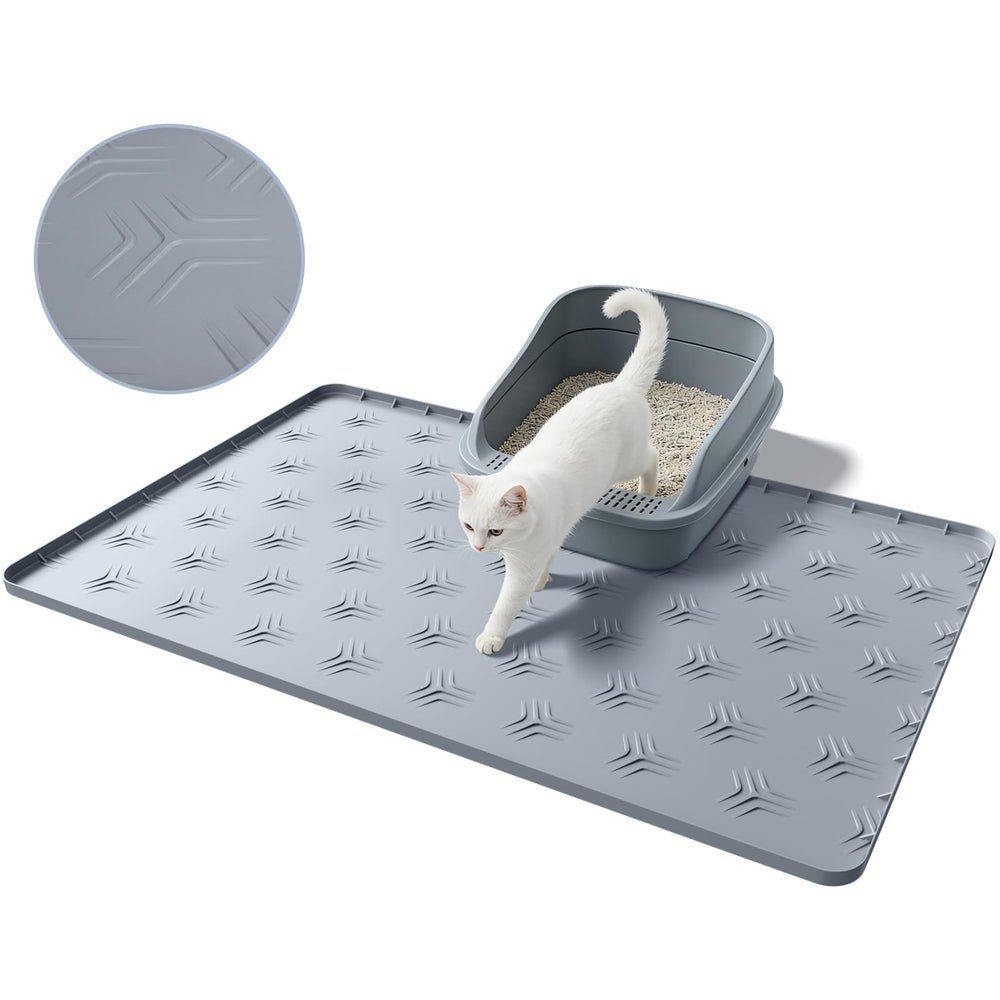 JUJOMAT cat litter box mat catching litter around the box.