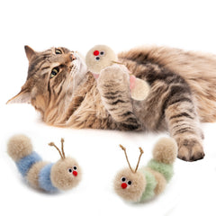 Jumpaws soft fluffy caterpillar cat toy encouraging chasing and cuddling.