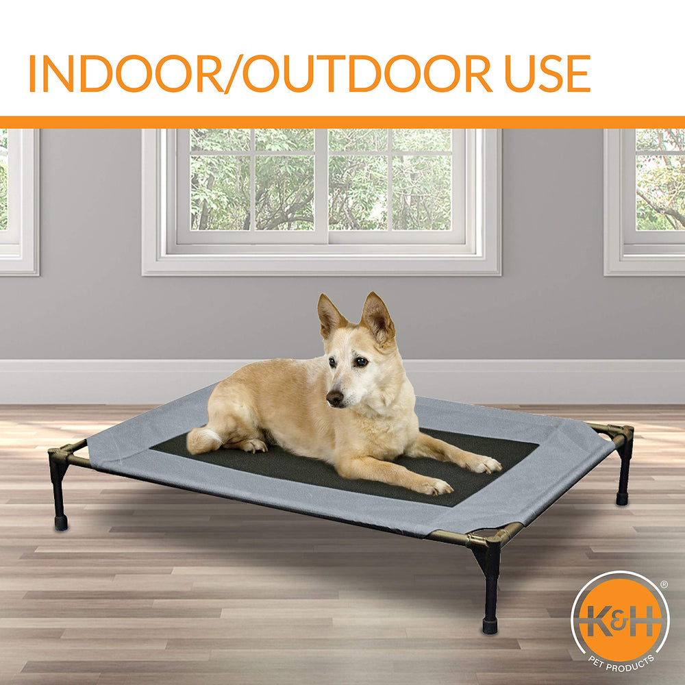 K&amp;H Pet Products indoor/outdoor cot offers versatile relaxation anywhere.