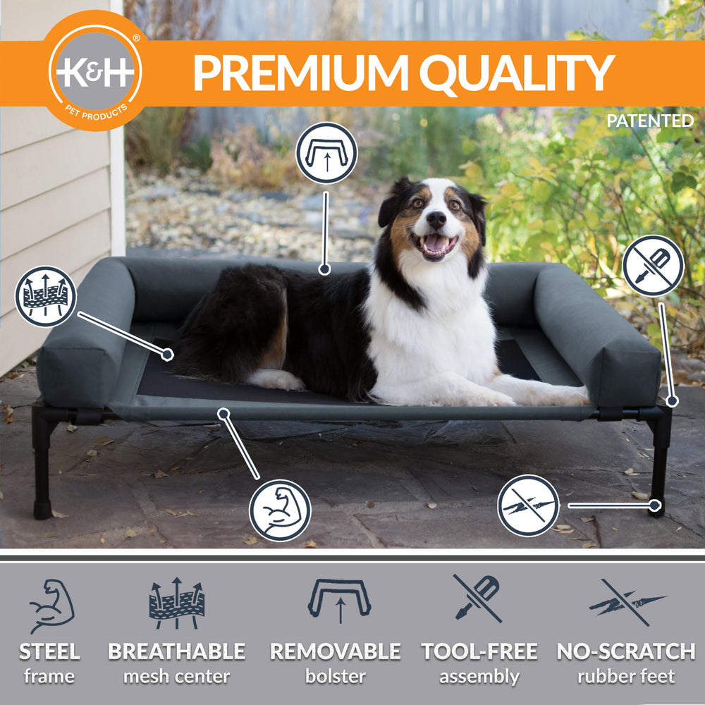K&amp;H Bolster Dog Cot outdoors in a yard for lounging