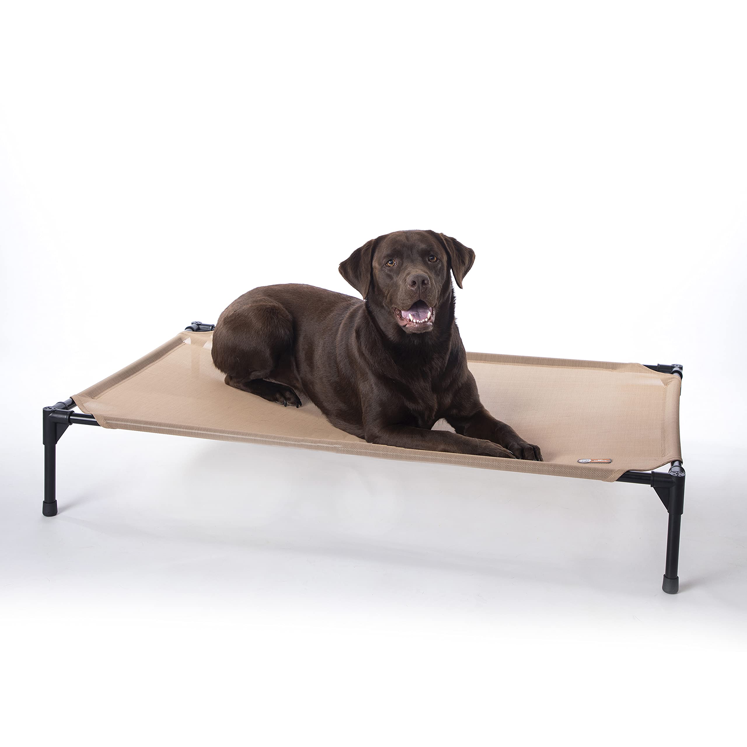 K&H Outdoor elevated dog bed on patio for cooling comfort