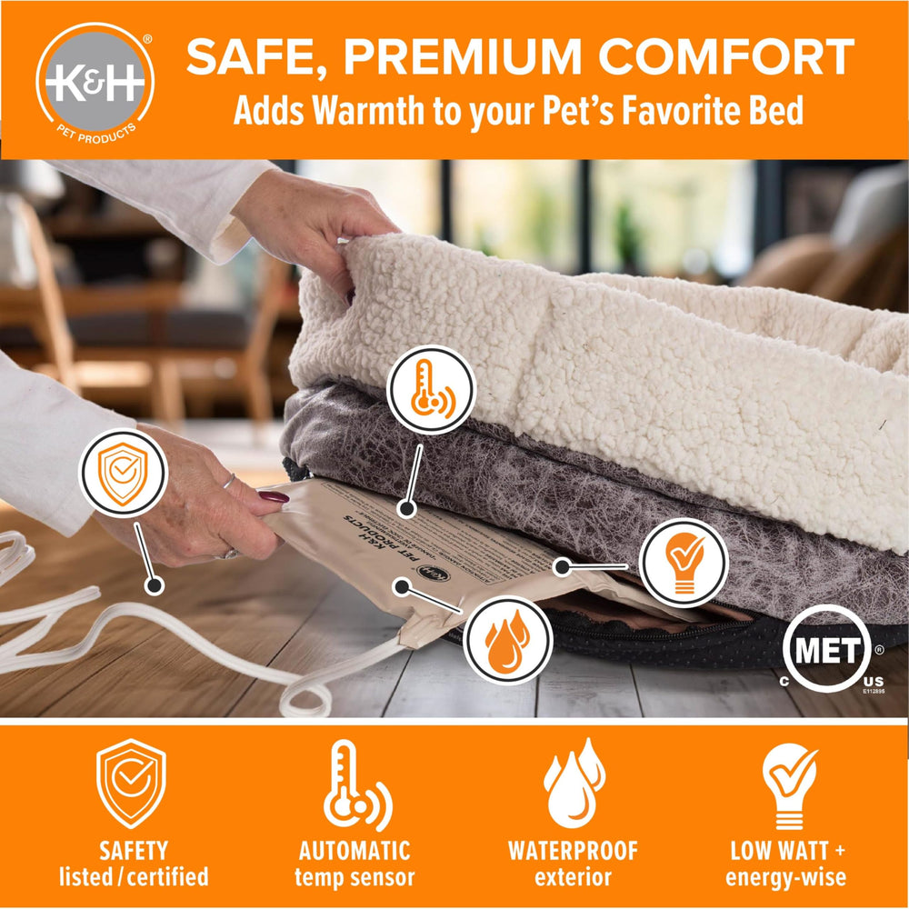 K&H Warmer tucked into a dog bed for continuous comfort during rest.