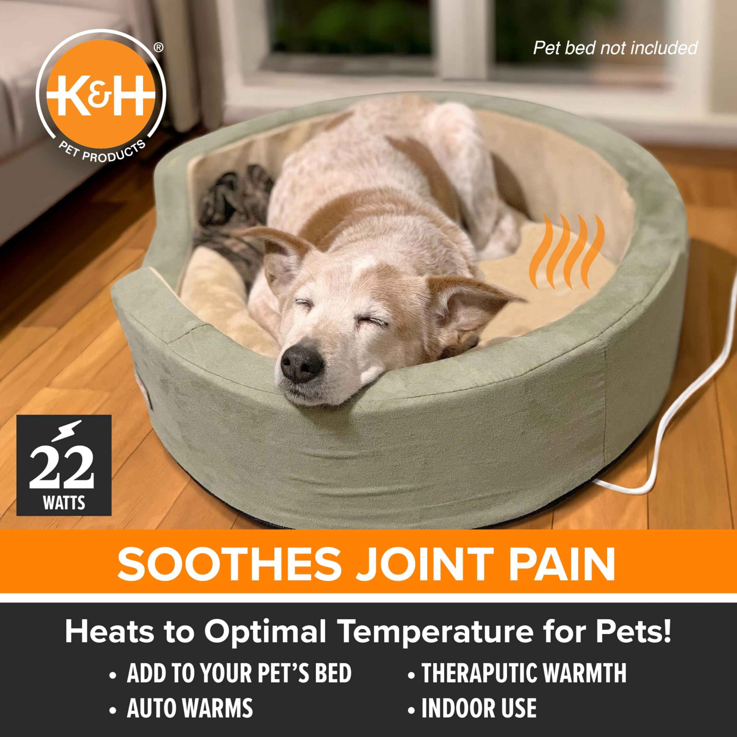 K&H Warmer on a sofa setup demonstrates versatility for various pet beds.