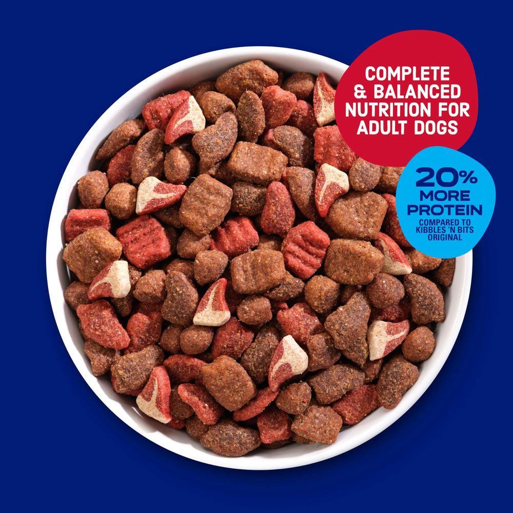 Kibbles 'n Bits Triple Steak serving bowl highlights protein-rich nutrition for dogs.