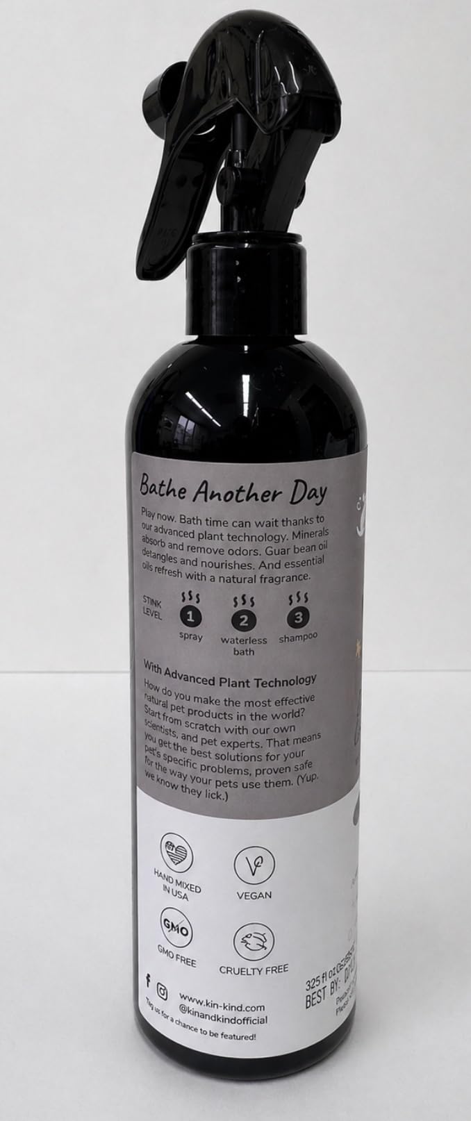 kin+kind patchouli scent spray close-up showing fine mist