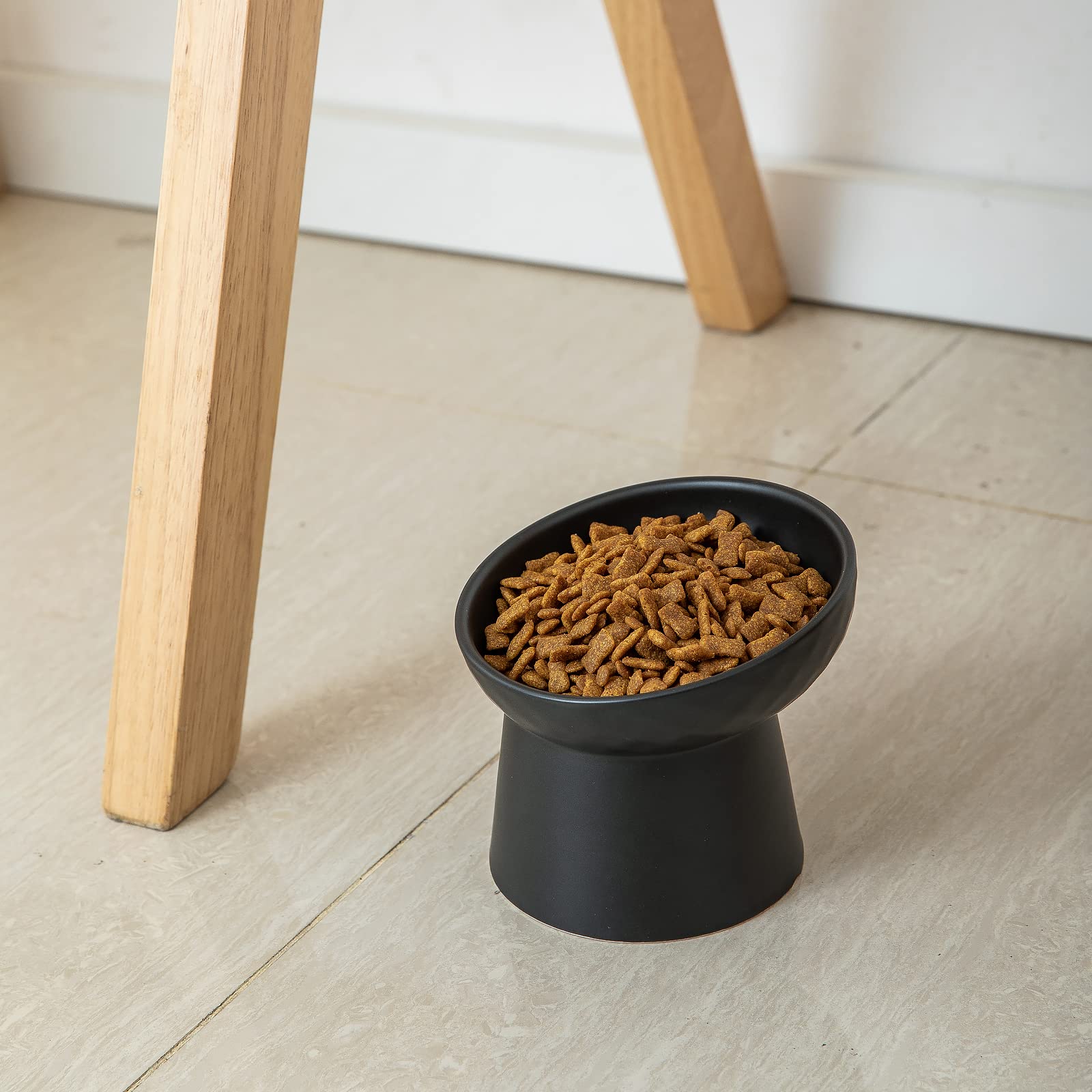 KitchenLestar two-pack black cat bowls offer stylish, durable feeding set.