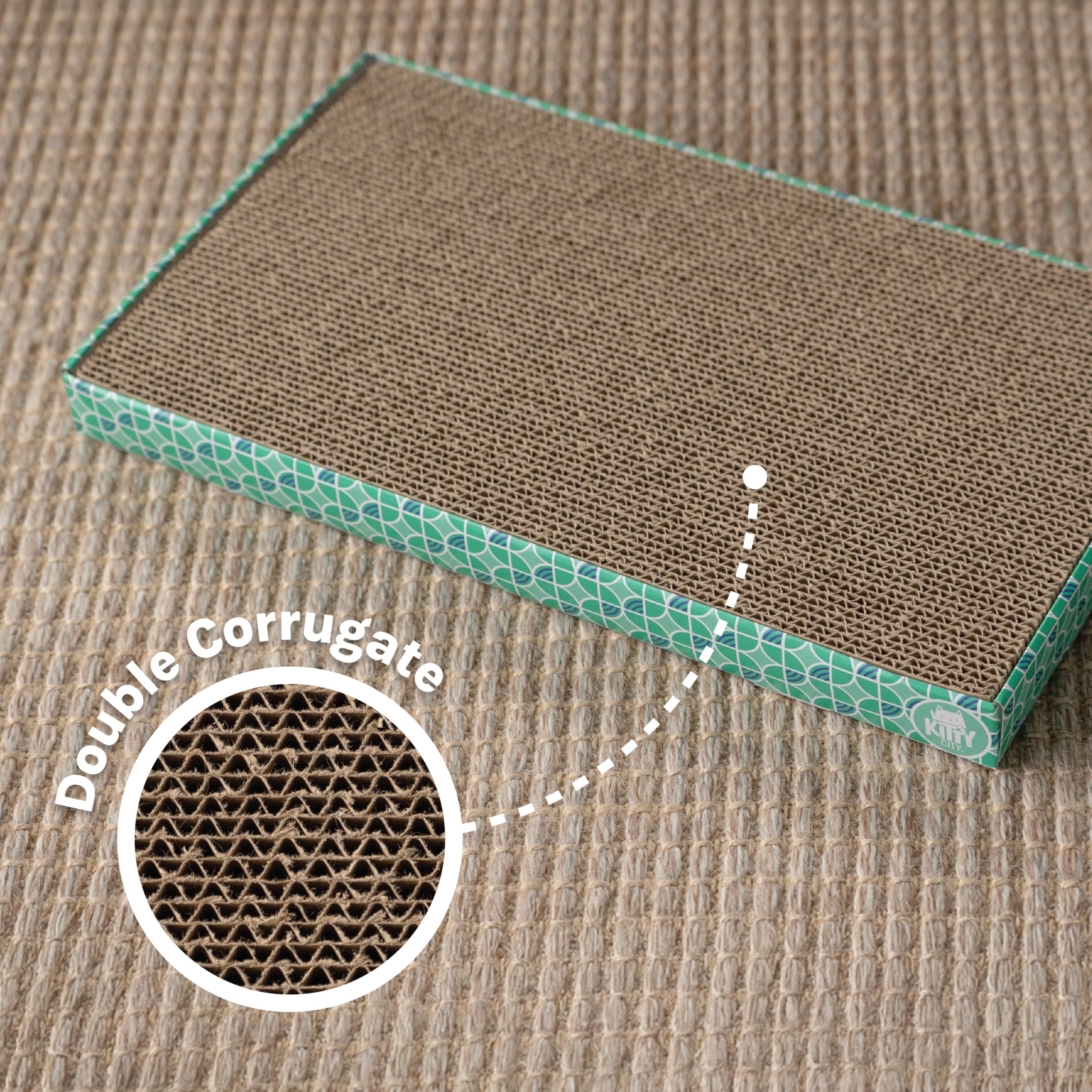 Kitty City durable corrugated cardboard scratch pad stands up to daily scratching.