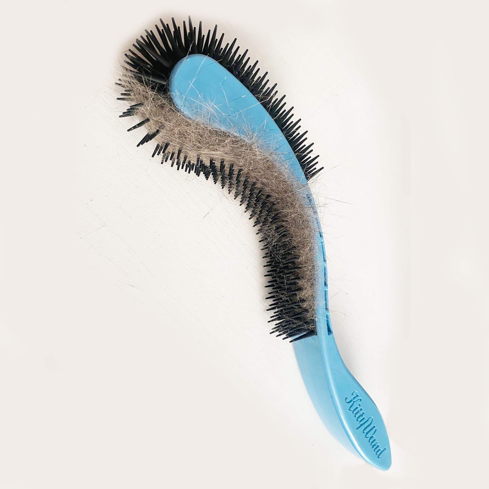 KittyWand cat brush blue easy grooming sessions.