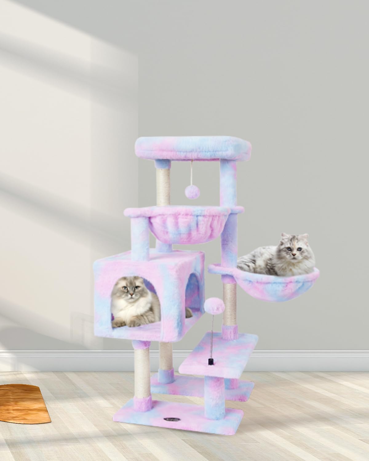 KIYUMI cat tree double hammocks providing two cozy resting spots