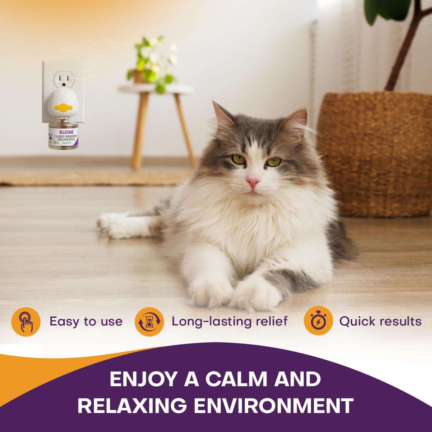 Klioak diffuser in use as cats relax together on a couch.