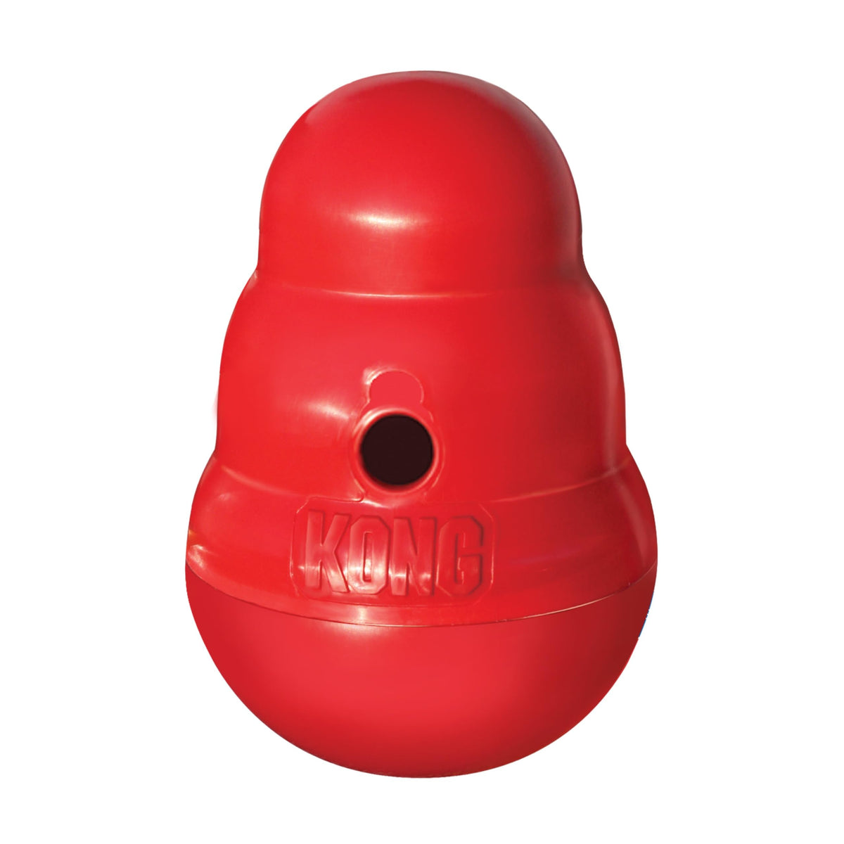 KONG Wobbler in action, engaging dogs with interactive treat dispensing during snack time.