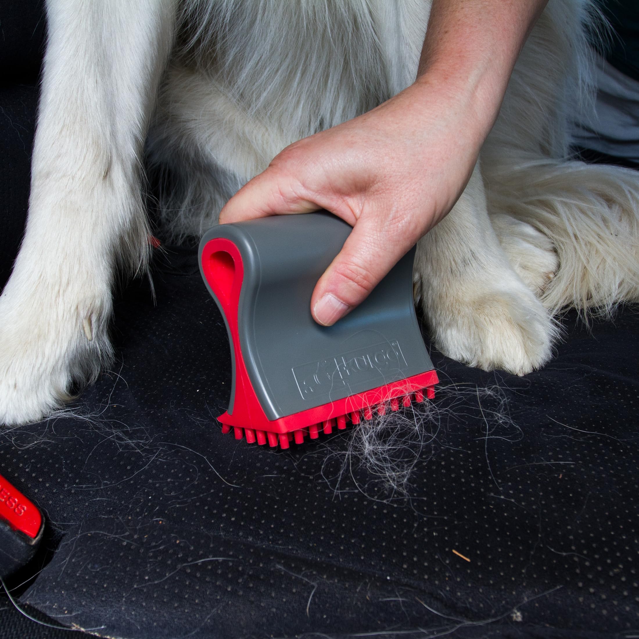 Kurgo Shed Sweeper car-seat fur removal helps keep mats presentable.