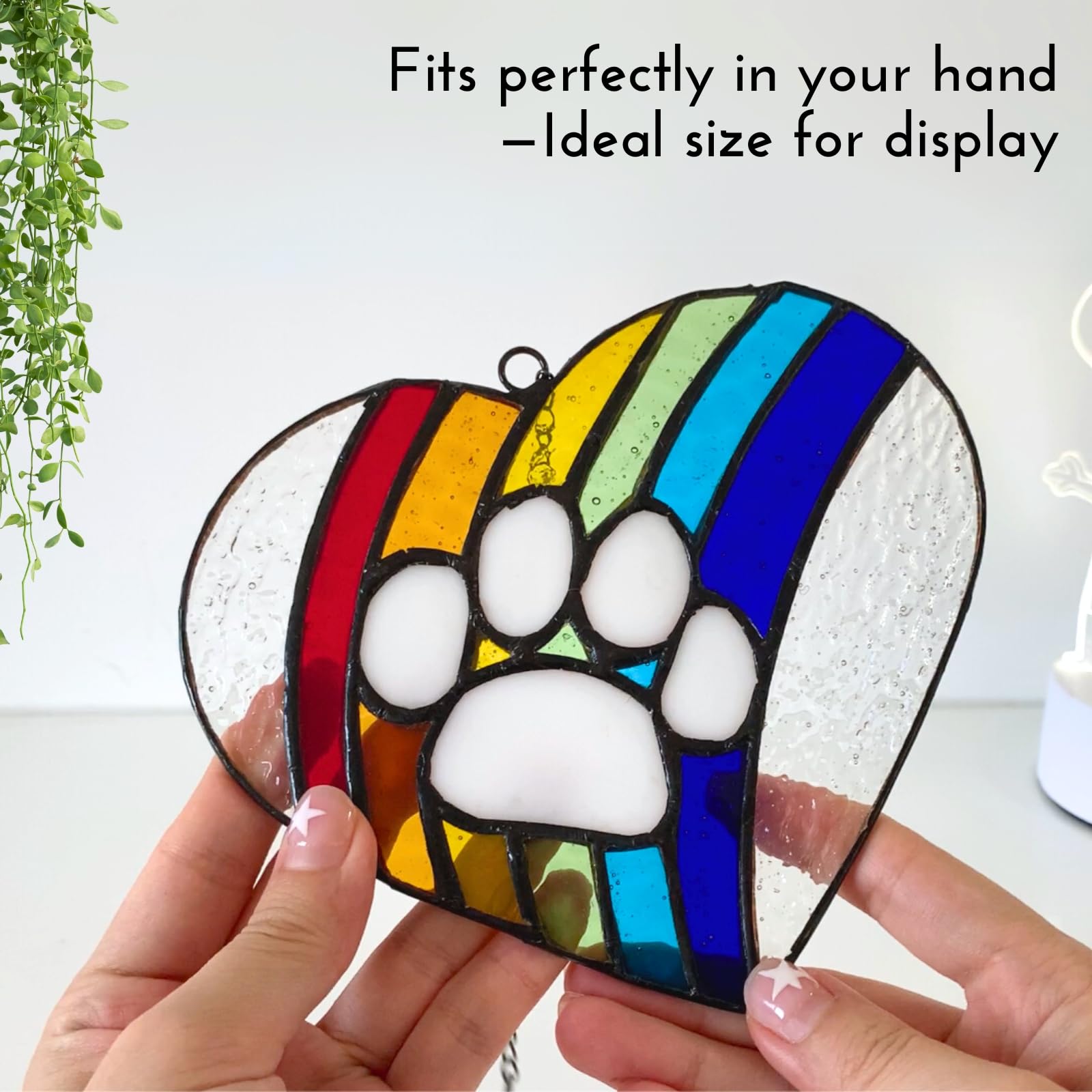 Lasting Tails handcrafted stained glass detail enhances windows with enduring beauty