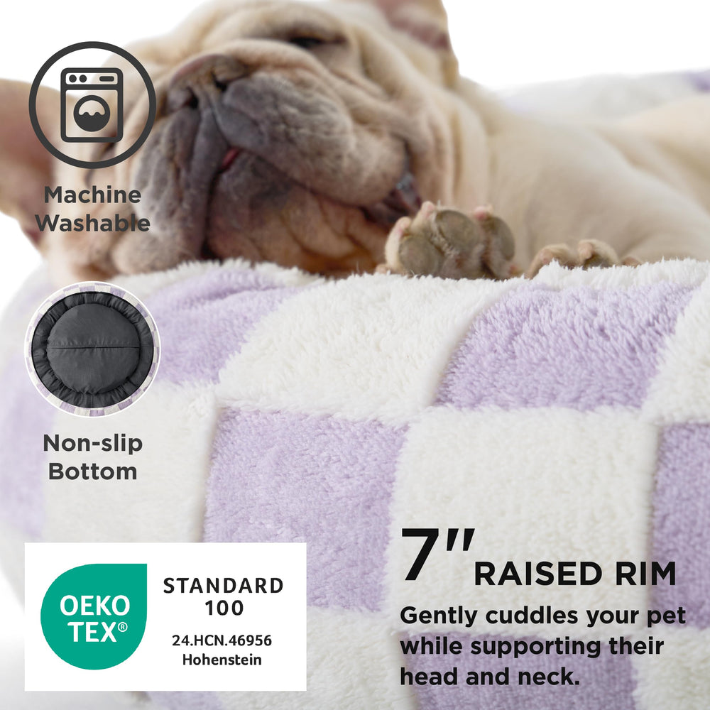 LE SURE donut bed bolstered edges provide secure head support.