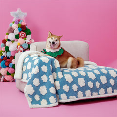 LE SURE waterproof dog blanket on a couch, protects furniture from accidents