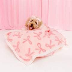 LE SURE waterproof puppy blanket front view with pink taffy bow design and plush textures.