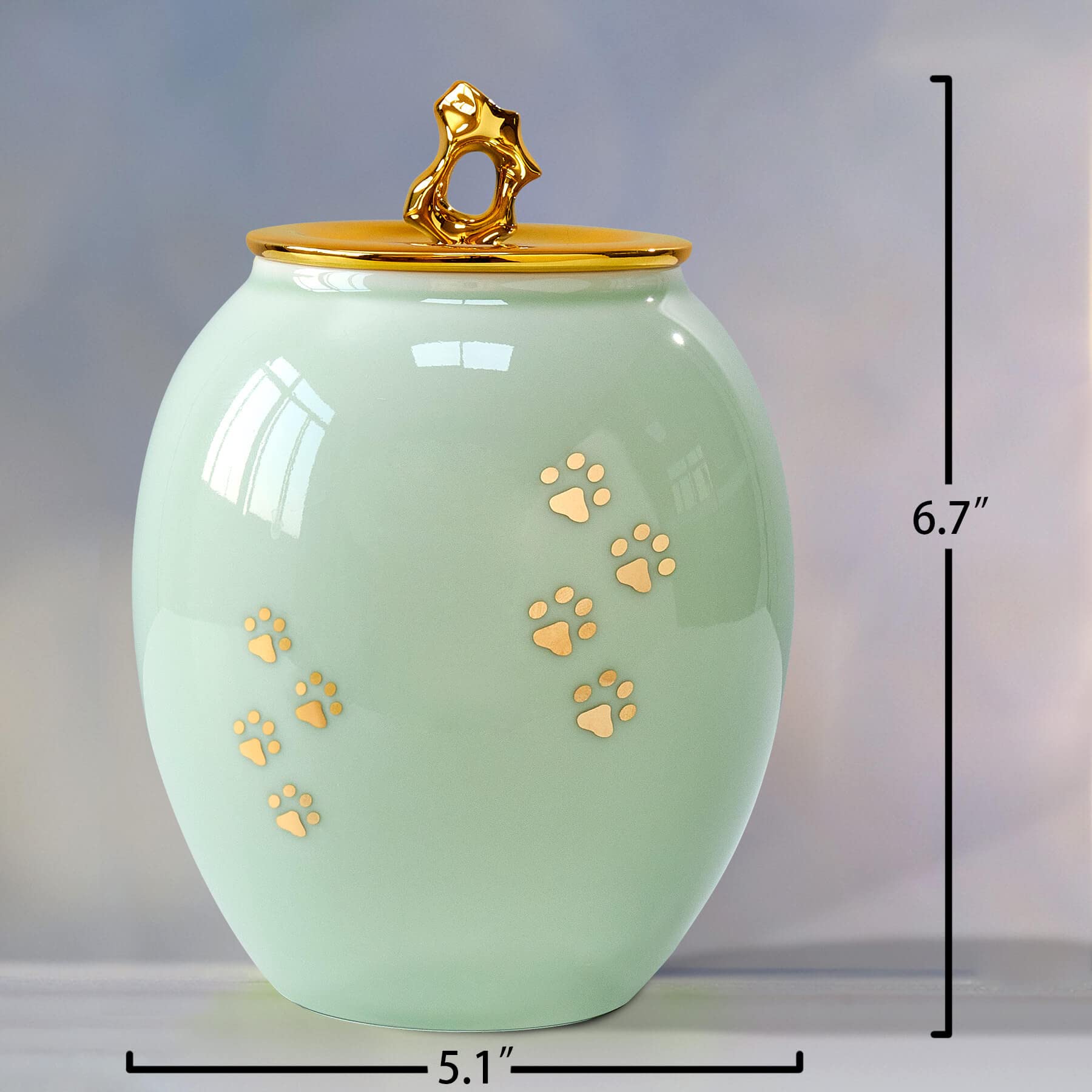 LINES ARTE medium pet urn for cats holds ashes with elegant paw prints detail.