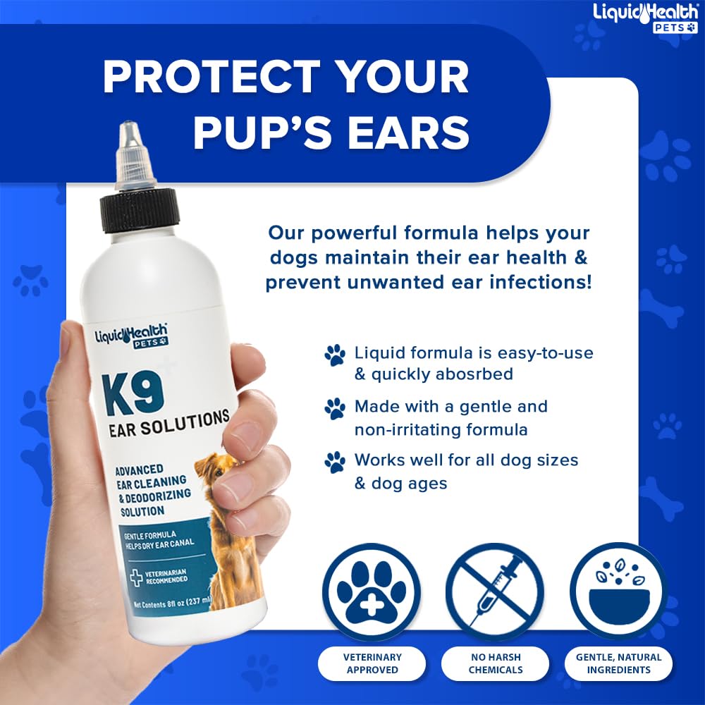LIQUIDHEALTH K9 Ear Cleaner being applied with a cotton ball to dog's ears.