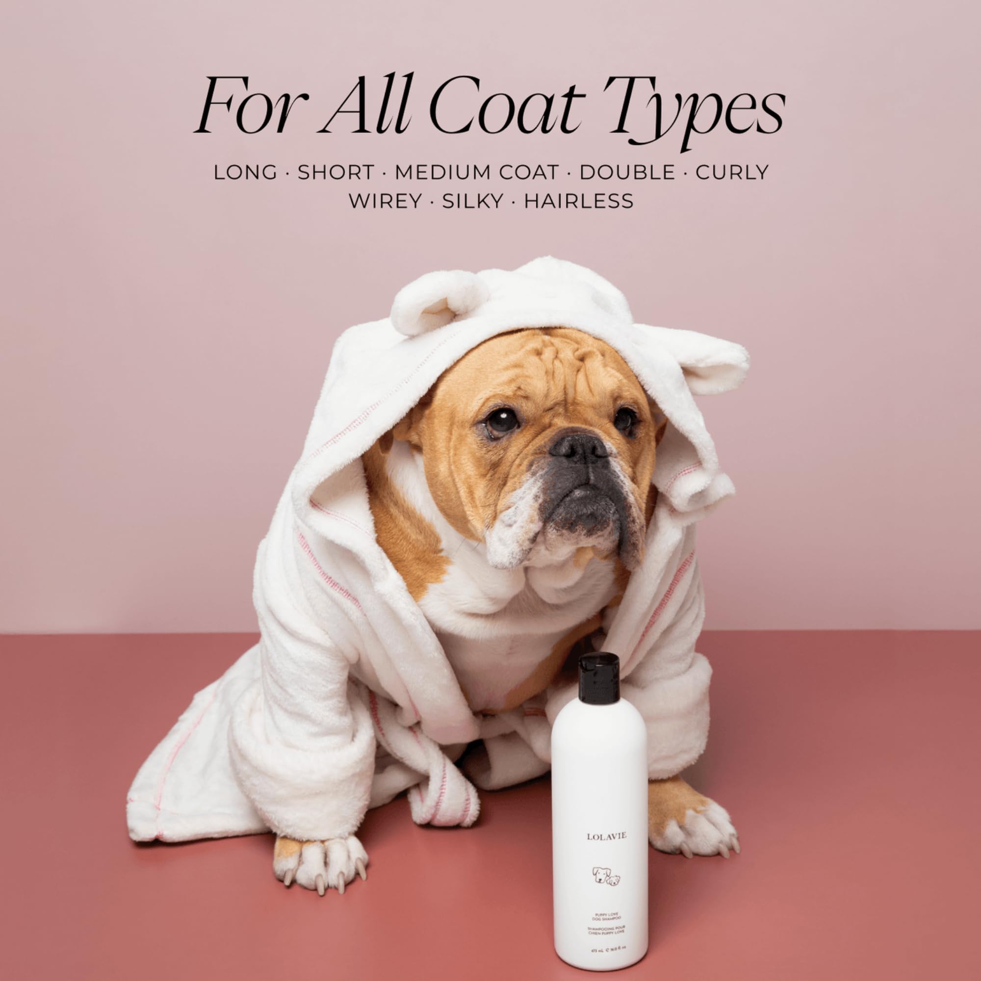 LolaVie Puppy Love Shampoo being applied during bath time on a pup.