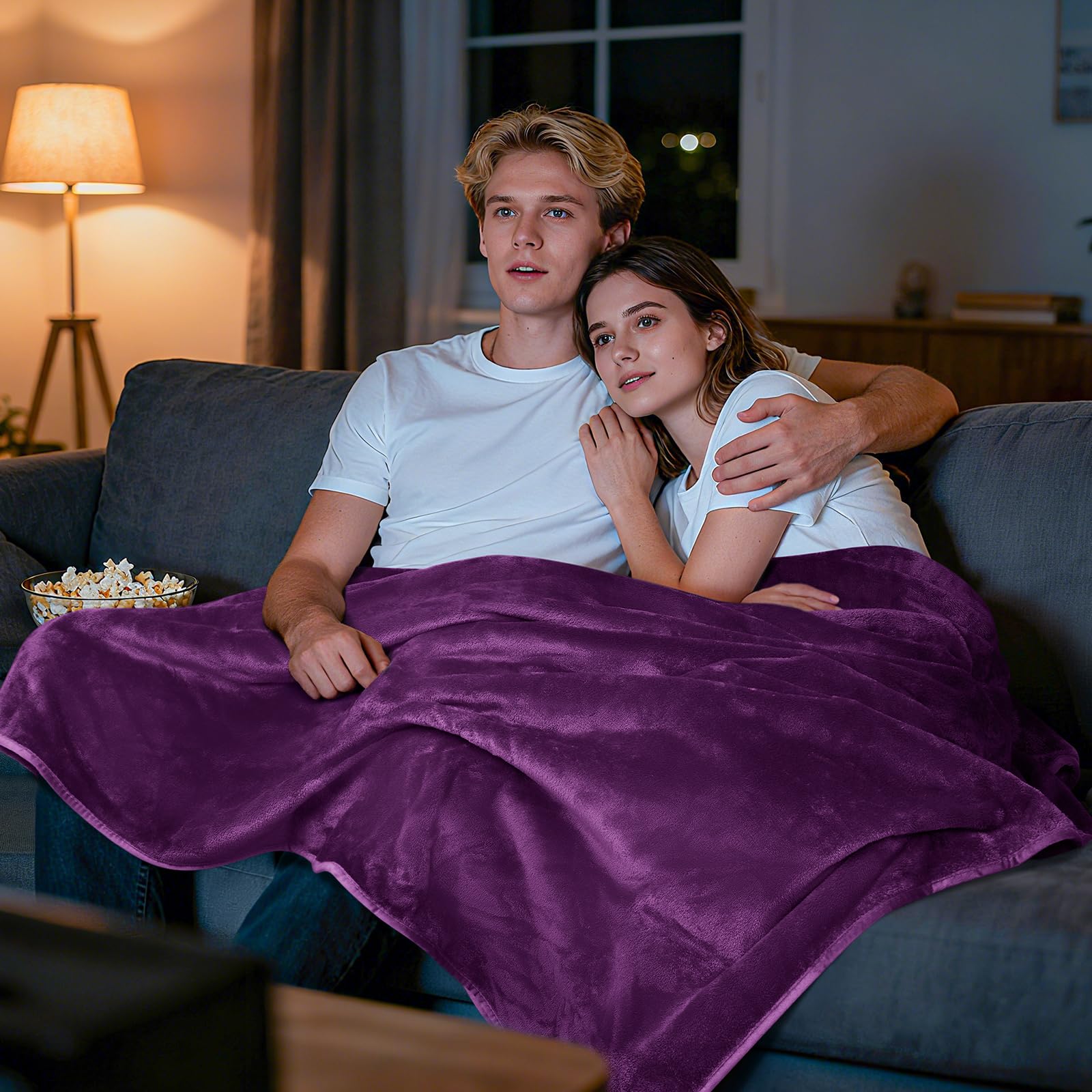 LOOBANI pet blanket on couch with a dog for protection.