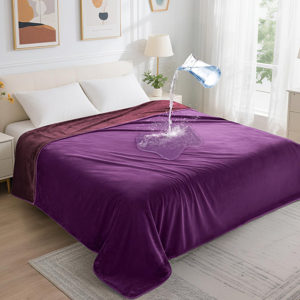 LOOBANI waterproof blanket on a purple bed shows reversible design for versatile styling.