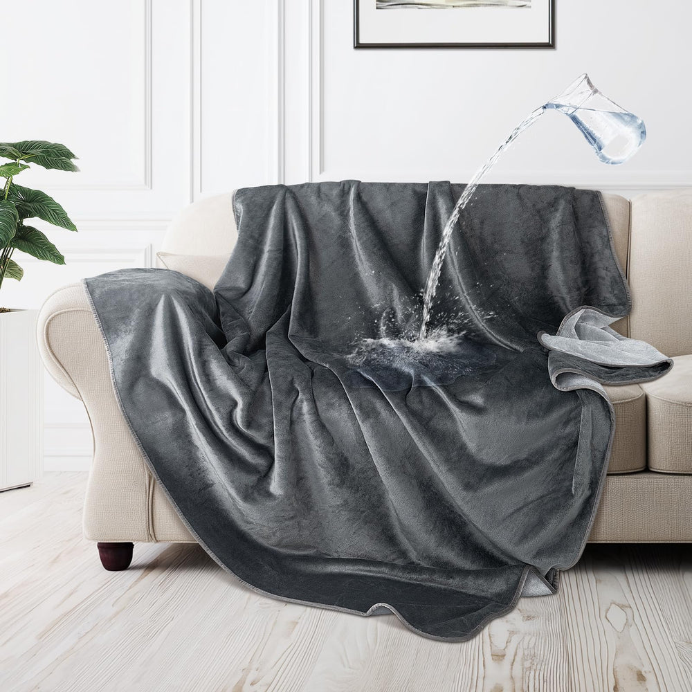 LOOBANI waterproof dog blanket on sofa protects furniture from spills.