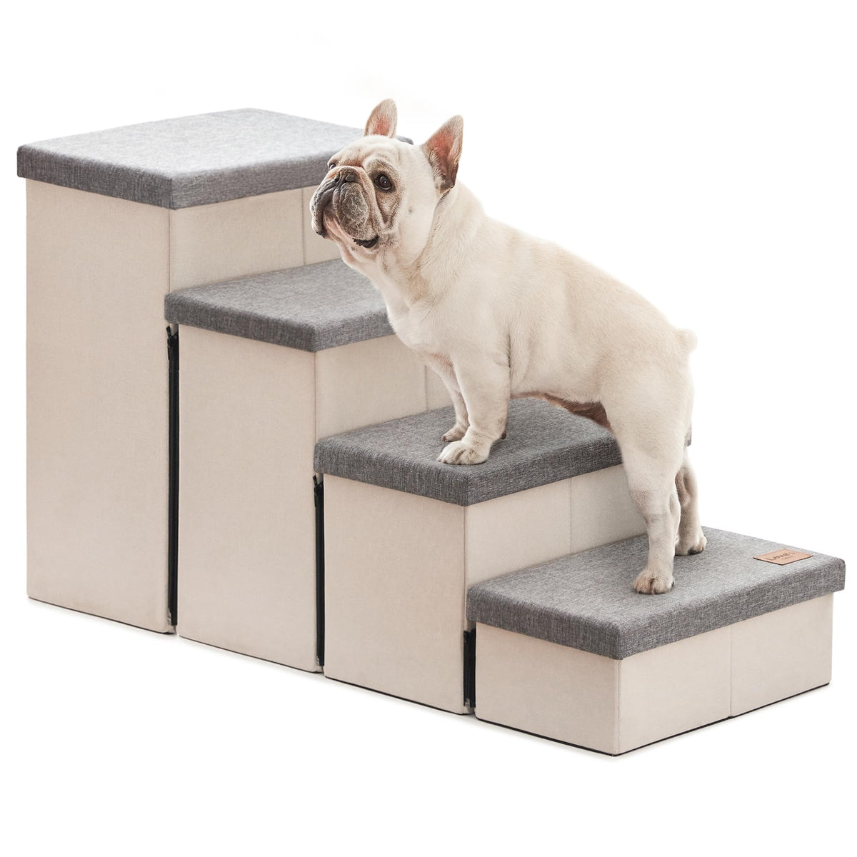Love's cabin dog stairs against a bed for easy access and pet comfort.