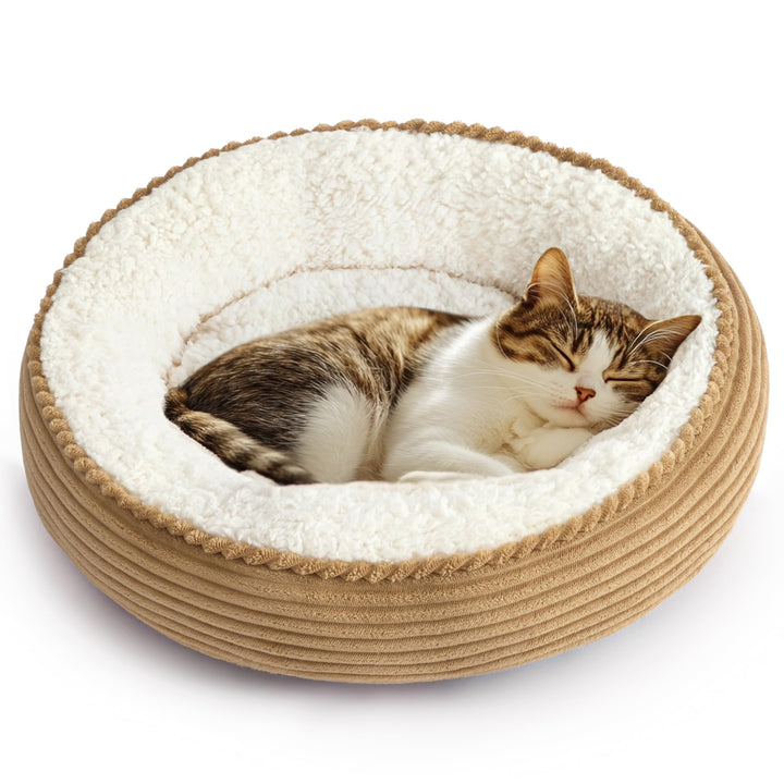 Love's cabin round donut bed in camel stripe offers cozy nesting for small pets.