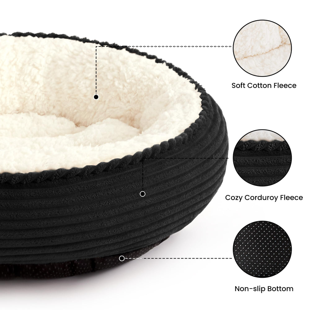 Love's cabin round donut bed side view highlights raised rim for head support.