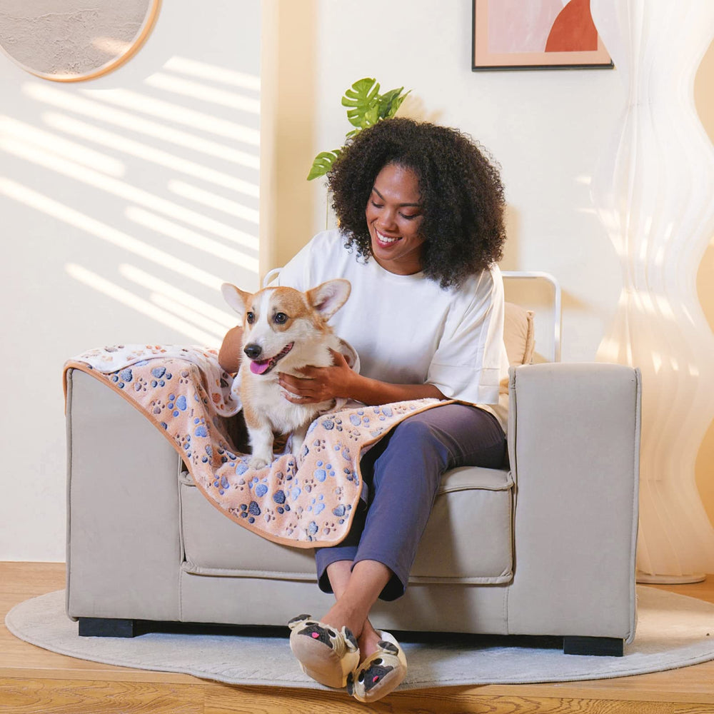 Luciphia blanket features brown, pink, and white colors to suit any room.